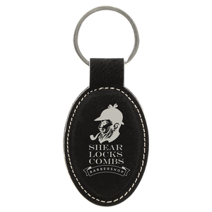 3" x 1 3/4" Black/Silver Laserable Leatherette Oval Keychain